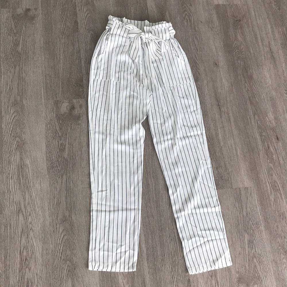 White pants with blue stripes , paperbag style